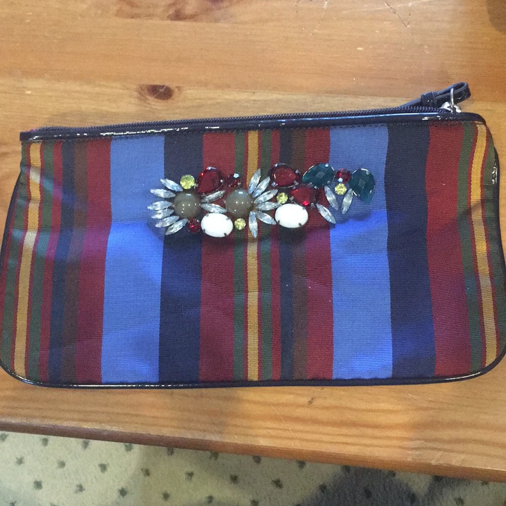 Striped clutch with jewels on front